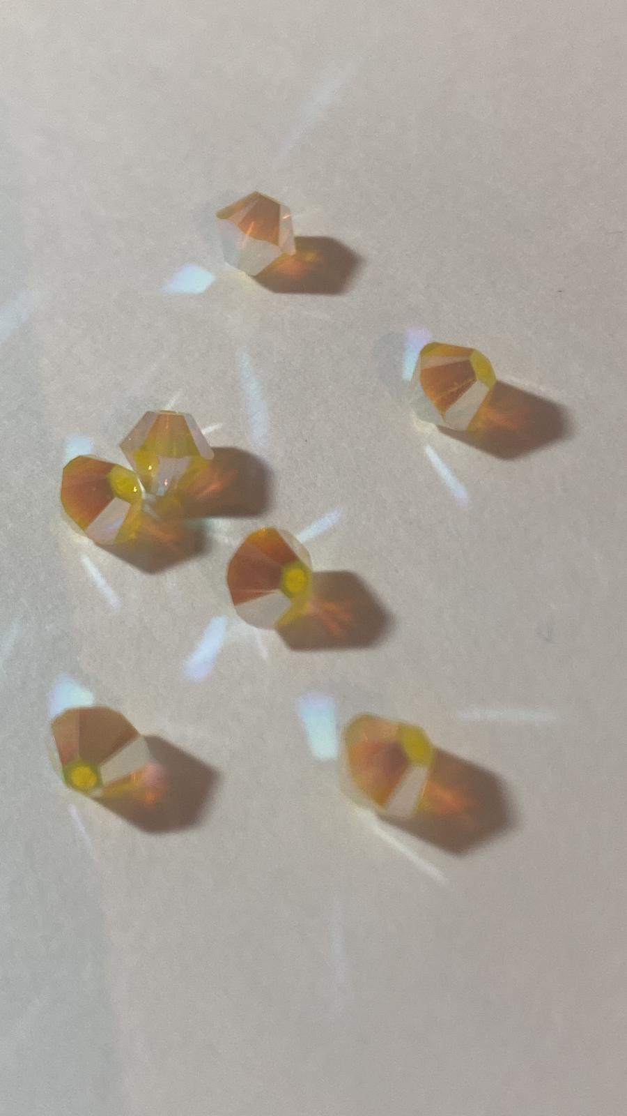 Swarovski® Beads Bicone Yellow Opal/Aurore Boreale 2X 4mm